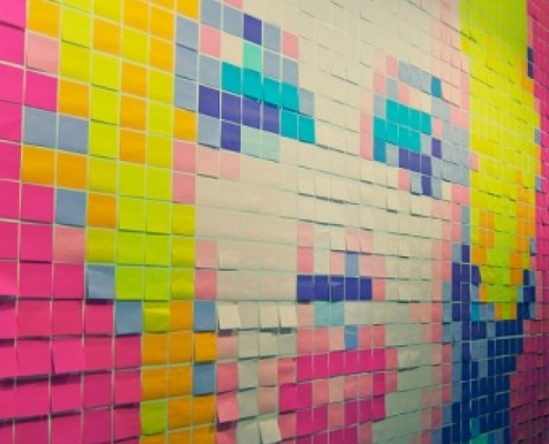 Post it notes stuck to a wall
